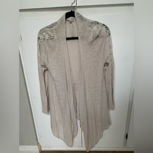 Cream color cover up with lace lined sleeves